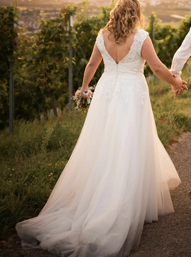 lace a line wedding dress with sweetheart neckline Sophia Tolli Strapless Misty Tulle A-Line With Deep Plunging Sweetheart  Neckline Wedding Gown main image 0